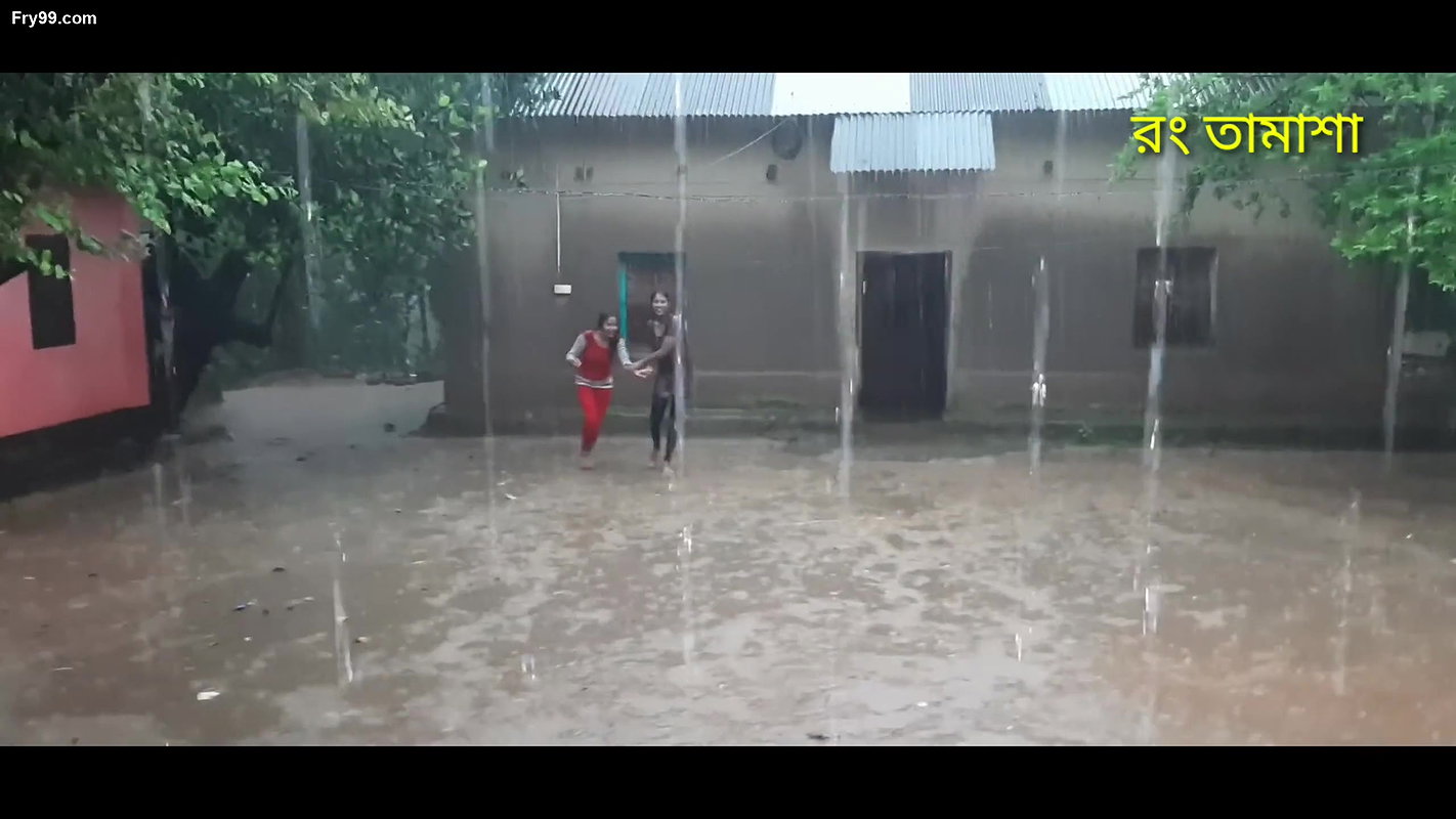 Two hot young girl enjoying in rain scene making