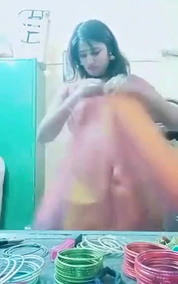 Swathi naidu sexy and romantic seducing in orange saree