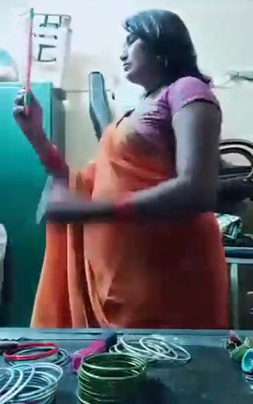 Swathi naidu sexy and romantic seducing in orange saree