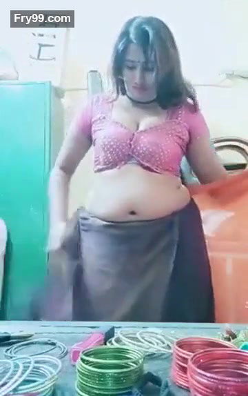 Swathi naidu sexy and romantic seducing in orange saree