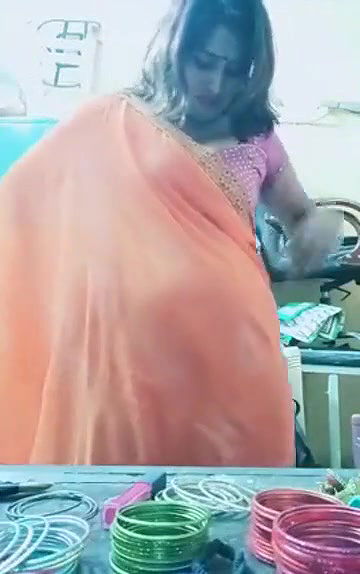 Swathi naidu sexy and romantic seducing in orange saree