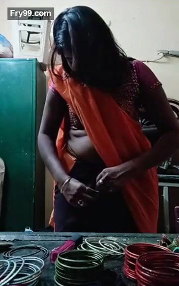 Swathi naidu sexy and romantic seducing in orange saree