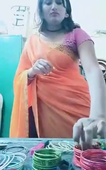 Swathi naidu sexy and romantic seducing in orange saree