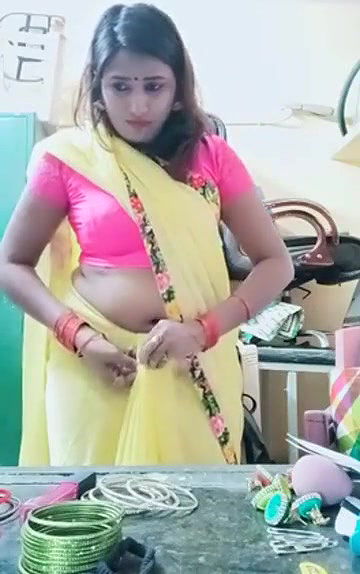 Swathi naidu sexy in yellow saree